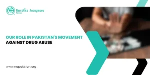 A blurry person holds up a hand in a "stop" gesture. Text reads: "OUR ROLE IN PAKISTAN'S MOVEMENT AGAINST DRUG ABUSE" with the Narcotics Anonymous logo.